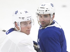 Toronto Maple Leafs centres Auston Matthews, left, and Nazem Kadri take part in practice in Toronto on Monday, April 9, 2018.