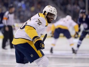 In this March 25 file photo, Nashville Predators defenceman P.K. Subban jokes with goaltender Pekka Rinne before a game against the Winnipeg Jets.