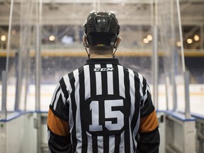 ndrea Barone, an openly gay referee in the ECHL, wears a pride sticker on his helmet at the Mattamy Athletic Centre on Sept. 13, 2017.