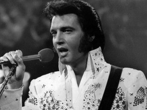 In this undated file photo released by NBC-TV, singer Elvis Presley is shown in concert in the later part of his career.