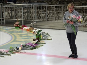 Flowers and chairs have been placed in the arena where a vigil will be held tonight, remembering those who died in the crash.