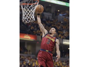 Cleveland Cavaliers' George Hill goes up for a dunk during the first half against the Indiana Pacers in Game 3 of a first-round NBA basketball playoff series Friday, April 20, 2018, in Indianapolis.