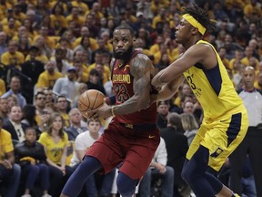 Cleveland Cavaliers' LeBron James (23) goes to the basket as Indiana Pacers' Myles Turner defends during the first half of Game 3 of a first-round NBA basketball playoff series Friday, April 20, 2018, in Indianapolis.