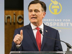 File - In this Feb. 20, 2018 file photo, U.S. Senate candidate Luke Messer speaks during the Indiana Republican Senate Primary Debate in Indianapolis. Messer was a no-show to an event in Kokomo with supporters on Wednesday, April 4 thanks to a cancelled flight. He missed Gov. Eric Holcomb's GOP fundraising dinner in November. And over the summer, he left an Anderson venue before Vice President Mike Pence name-checked him during a speech on the Republican-led tax overhaul. Such are the difficulties, and liabilities, Messer has created as he campaigns in an intense GOP primary while living nearly 600 miles away, in suburban Washington D.C.