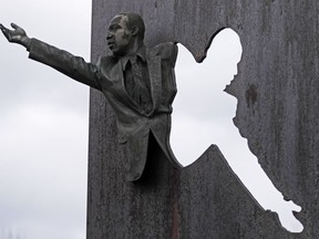A sculpture of Martin Luther King Jr. is part of the memorial "Landmark for Peace" commemorating the site where Robert Kennedy delivered his words on the night of King's assassination in Indianapolis, Wednesday, April 4, 2018. The park where Kennedy called for peace and unity just hours after the assassination of King is being designated a National Historic Site.