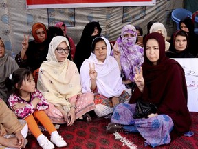 Pakistani lawyer Jalila Haider, center, from Hazara Shiite minority community participates in a hunger strike with others at a camp in Quetta, Pakistan, Monday, April 30, 2018. Haider, a lawyer in Pakistan has gone on hunger strike to bring attention to a string of killings of Shiites in the city of Quetta.