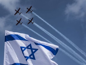 A military air show marks the 69th anniversary of Israel's independence on May 2, 2017, in Tel Aviv.