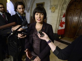 Minister of Health Ginette Petitpas Taylor speaks to reporters following Question Period in the House of Commons on Parliament Hill in Ottawa on Wednesday, April 18, 2018.