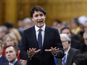 Prime Minister Justin Trudeau rises during Question Period in the House of Commons on Parliament Hill in Ottawa on Tuesday, April 24, 2018. Trudeau is being asked to raise the concerns of marginalized women - and not just female business leaders - as he champions gender equality around the G7 table at a resort in La Malbaie, Que., in June.