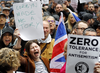 Protestors gather for a demonstration organized by the Campaign Against Anti-Semitism outside the head office of the British opposition Labour Party in London on April 8, 2018.