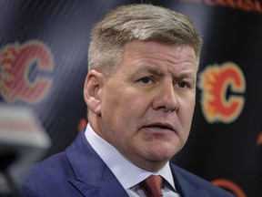 New Calgary Flames' head coach Bill Peters speaks to the media in Calgary, Monday, April 23, 2018.THE CANADIAN PRESS/Jeff McIntosh