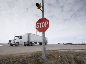 The stop sign on highway 335 is seen at the intersection of highway 35 near Tisdale, Sask., Tuesday, April, 10, 2018. This is the intersection where a bus carrying the Humboldt Broncos hockey team crashed into a truck en route to Nipawin for a game Friday night killing 15 and sending over a dozen more to the hospital.