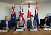 Australian Prime Minister Malcolm Turnbull, British Prime Minister Theresa May, Canadian Prime Minister Justin Trudeau and New Zealand Prime Minister Jacinda Ardern at the National Cyber Security Centre on April 18, 2018 in London, England.
