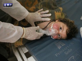 A child is treated at a makeshift hospital following a chemical attack in the Syrian town of Khan Sheikhoun in a photo provided by anti-government activists on April 4, 2017.