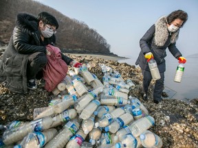 The three pounds of rice in each bottle, donated by South Korean churches, is worth about two months' salary for a state worker in North Korea. Lee Hae-kyung (not pictured here) who worked as a pharmacist at a hospital in North Korea, had come to the river bank bringing with him antiseptic ointment and worming tablets to counteract parasites - like the ones that riddled the soldier who escaped across the border to the south last year.