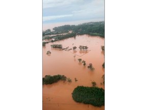 This Sunday, April 15, 2018 image taken from video provided by the U.S. Coast Guard shows flooding along Kauai's Hanalei Bay, Hawaii. Hawaii Gov. David Ige issued an emergency proclamation for the island where heavy rainfall damaged or flooded dozens of homes in Hanalei, Wainiha, Haena and Anahola.