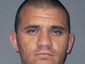 This undated booking photo provided by the Montana Department of Corrections shows Zachary Hoven, who authorities say was killed Monday, April 9, 2018, by a Billings police after he advanced on officers with a knife and refused commands to drop the weapon.  Officials said Hoven was waving a knife, threw knives at officers and was advancing on them when he was shot repeatedly. An earlier attempt to subdue him with a stun gun failed. (Montana Department of Corrections via AP)