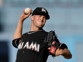 Miami Marlins starting pitcher Trevor Richards throws to the plate during the second inning of a baseball game against the Los Angeles Dodgers Wednesday, April 25, 2018, in Los Angeles.
