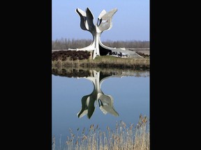 FILE - This March 16, 2004 file photo shows the monument for thousands of people killed in Jasenovac concentration camp 1941-45 in Croatia. Croatia's president on Friday April 20, 2018, visited the site of a World War II concentration camp and honored its victims despite a continued boycott by Croatia's Jews of the official commemoration ceremonies.