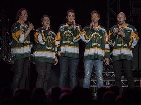 The Hunter Brothers perform the national anthem during the Country Thunder Humboldt Broncos tribute concert in Saskatoon, Sask. Friday, April 27, 2018.