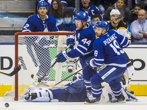 Toronto Maple Leafs forward Tomas Plekanec (right) eyes a loose puck against the Boston Bruins on April 16.