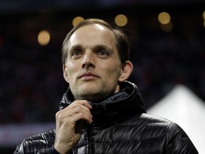 FILE - In this Wednesday, April 26, 2017 file photo, Dortmund's head coach Thomas Tuchel arrives for their German Soccer Cup semifinal match against FC Bayern Munich at the Allianz Arena stadium in Munich, Germany. Arsenal is looking for a new manager for the first time this century after Arsene Wenger on Friday, April 20, 2018 announced his decision to leave his role at the end of this season. Regarded as a brilliant tactician and owning a reputation for giving young players a chance at the top level, Tuchel has been without a club since getting fired by Borussia Dortmund in May last year.