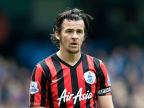 FILE - In this Sunday, May 10, 2015 file photo, Queens Park Rangers' Joey Barton watches the ball during their English Premier League soccer match at the Etihad Stadium, Manchester, England.Joey Barton will take up his first coaching job in June once his suspension for breaching betting rules has expired. The 35-year-old Barton has been hired as the new coach of third-tier team Fleetwood on a three-year deal, it was announced on Wednesday, April 18, 2018.