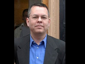 FILE - In this undated file photo, Andrew Brunson, an American pastor, stands in Izmir, Turkey. The trial of an American pastor imprisoned in Turkey, whose case is part of the quagmire of tense relations between Washington and Ankara, is set to begin Monday, April 16, 2018 in western Izmir province. Andrew Craig Brunson, an evangelical pastor from North Carolina, is facing 35 years in prison on the charges of "committing crimes on behalf of terror groups without being a member" and "espionage." (DHA-Depo Photos via AP, File)