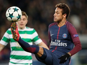 FILE - In this Wednesday, Nov. 22, 2017 file photo, PSG's Neymar kicks the ball during a Champions League Group B soccer match between Paris St. Germain and Celtic at the Parc des Princes stadium in Paris, France. Neymar has been named among the four nominees for the French League's Player of the Year award. The winner is announced on May 13, 2018.