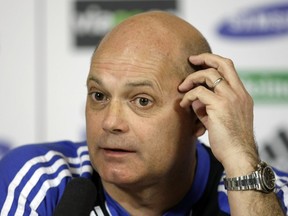 FILE - In this Friday, Feb. 13, 2009 file photo, Chelsea coach Ray Wilkins speaks during a news conference at the team's training facilities in Stoke d'Abernon, England. Ray Wilkins, who captained England's national soccer team and played for illustrious teams such as Manchester United, Chelsea and AC Milan in a 24-year career, died Wednesday April 4, 2018. He was 61.