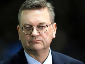 FILE - In this file photo dated Tuesday, March 27, 2018, showing Reinhard Grindel, President of the German Soccer Association (DFB), during a soccer match against Brazil, in Berlin.  Speaking about the upcoming election of the 2026 World Cup host country, FIFA Council member Reinhard Grindel tells The Associated Press Tuesday April 24, 2018, the decision-making power must stay with more than 200 member federations, saying "If there are only two (candidates), the congress must have the chance to vote."