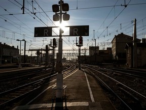 FILE - In this file photo dated Thursday, March 22, 2018, an empty train platform is pictured during a railway strike at the Lyon Perrache train station, central France.  France's national train company SNCF said in a statement Sunday April 1, 2018, warning that a workers' strike will disrupt train service within France and elsewhere in Europe on upcoming Tuesday and Wednesday.