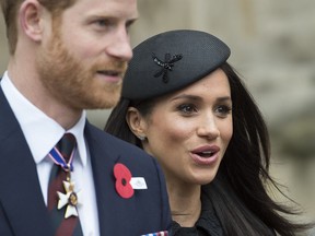 Britain's Prince Harry and Meghan Markle attend a Service of Thanksgiving and Commemoration on ANZAC Day at Westminster Abbey in London, Wednesday, April 25, 2018.