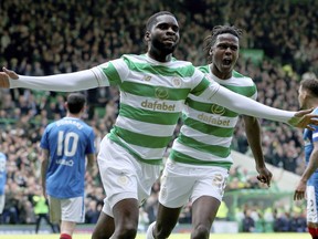 Celtic's Odsonne Edouard celebrates scoring his side's first goal during the Scottish Premiership soccer match between Celtic and Rangers at Celtic Park, in Glasgow, Scotland, Sunday April 29, 2018. Celtic have won the Scottish Premiership league.