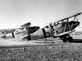 FILE - In this photo issued Sunday April 1, 2018, by Britain's Ministry of Defence showing two Hawker Hart light bombers of 39 Squadron at Miranshah on the North West Frontier, Pakistan in 1938, as part of a collection of images marking the centenary of the world's first independent air force.  It was 100-years ago on April 1 1918 that the Royal Flying Corps and the Royal Naval Air Service merged to created the Royal Air Force. Queen Elizabeth II sent congratulations to the Royal Air Force on the 100th anniversary of its founding, with her message read out by 16-year old Adam Wood, one of the youngest members of the RAF.