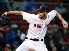 Boston Red Sox's Chris Sale pitches during the first inning of the team's baseball game against the New York Yankees in Boston, Tuesday, April 10, 2018.