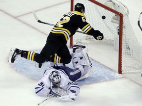 Sean Kuraly of the Bruins scores against Toronto Maple Leafs goaltender Frederik Andersen during the third period of Game 1 of their first-round playoff series on Thursday night in Boston.