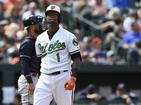 Baltimore Oriole's Tim Beckham reacts after striking out against the Cleveland Indians in the seventh inning of baseball game, Sunday, April 22, 2018, in Baltimore. The Indians won 7-3.