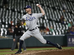 Tampa Bay Rays relief pitcher Jonny Venters throws to the Baltimore Orioles during the sixth inning of a baseball game, Wednesday, April 25, 2018, in Baltimore.