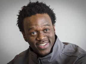 In this April 12, 2018 photo, Allan Monga, 17, a high school student who fled his native Zambia, recites a poem during a news conference in Portland, Maine. Monga, who won the state Poetry Out Loud Contest, is suing the National Endowment for the Arts for not allowing him to compete in the national contest because he has not yet been granted asylum in the United States.