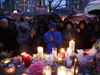 People attend a vigil for the victims of the Toronto van attack, April 24, 2018 in Toronto.