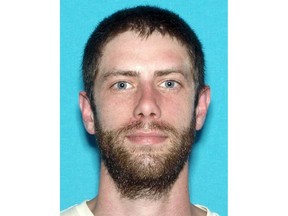 This undated identification photo released by the Maine State Police shows John Williams of Madison, Maine, who is being sought in connection with the shooting of a Somerset County sheriff's deputy very early Wednesday morning, April 25, 2018, in Norridgewock, Maine. Deputy Eugene Cole was killed while responding to a reported robbery. Police said Cole had been a deputy for 13 years and has a son. (Maine State Police via AP)