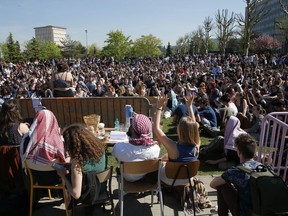 Students gather during a general assembly at Nanterre's university, outside Paris, France, Thursday, April 19, 2018. Students continue to occupy campuses across France to protest university admission reforms that they fear threaten university access for high school graduates.