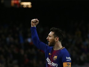 FC Barcelona's Lionel Messi celebrates after scoring during the Spanish La Liga soccer match between FC Barcelona and Leganes at the Camp Nou stadium in Barcelona, Spain, Saturday, April 7, 2018.