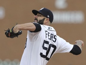 Detroit Tigers starting pitcher Mike Fiers throws during the first inning of a baseball game against the New York Yankees, Friday, April 13, 2018, in Detroit.