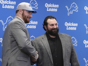 The Detroit Lions first-round NFL football draft pick Frank Ragnow, left, stands with head coach Matt Patricia at the team training facility, Friday, April 27, 2018, in Allen Park, Mich.
