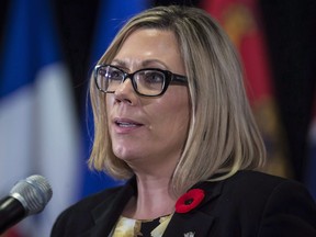 Manitoba Environment Minister Rochelle Squires responds to a question during a news conference after a Canadian Council of Ministers of the Environment meeting in Vancouver on Friday, November 3, 2017.