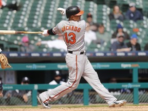 Baltimore Orioles' Manny Machado hits a one-run single against the Detroit Tigers in the eighth inning of a baseball game in Detroit, Wednesday, April 18, 2018.