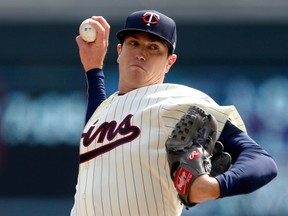Minnesota Twins pitcher Kyle Gibson throws against the Houston Astros in the first inning of a baseball game Wednesday, April 11, 2018, in Minneapolis.