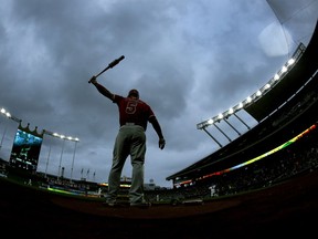 Los Angeles Angels' Albert Pujols warms up on deck during the second inning of a baseball game against the Kansas City Royals, Saturday, April 14, 2018, in Kansas City, Mo.